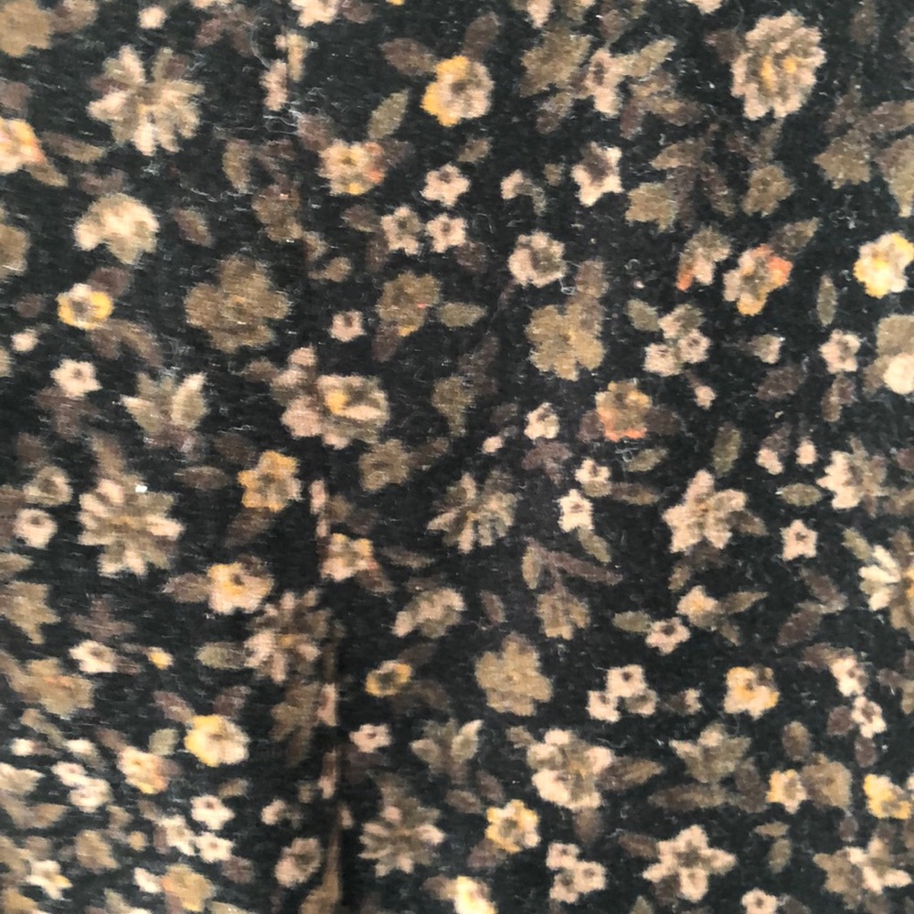 Black velvet with brown and tan floral pattern.